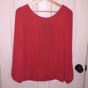 Red Blouse with Black Bow & Slit Detailing…